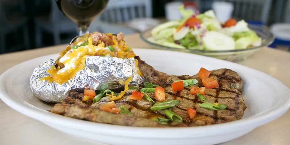 Steak dinner with baked potato